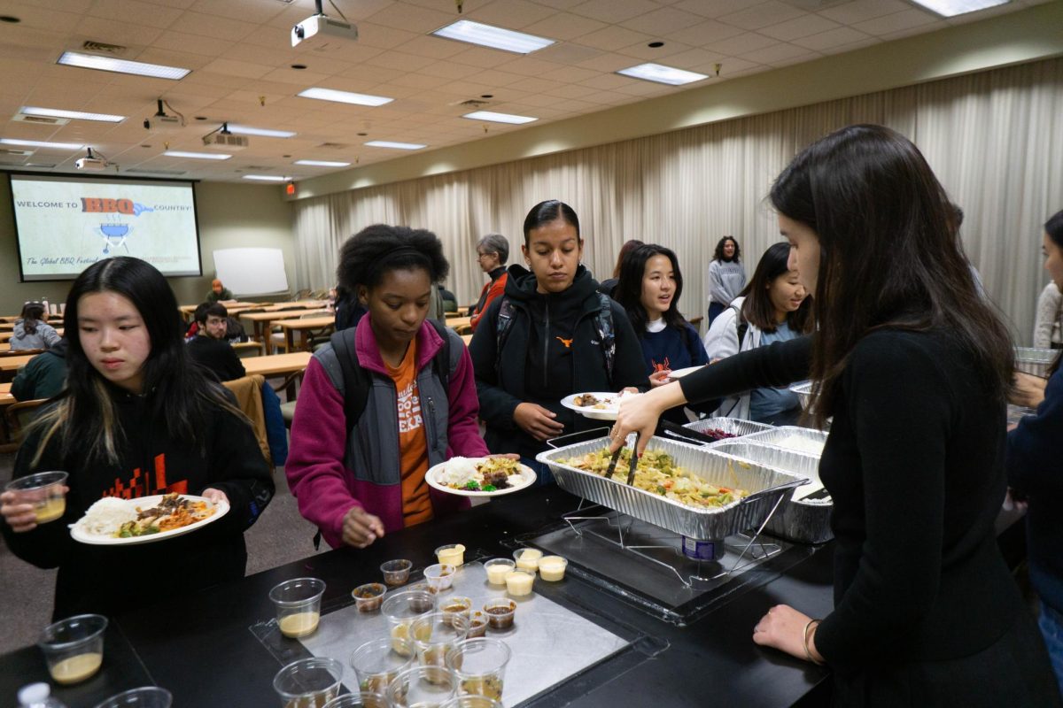 Students wait in line to get food at the Global BBQ Fest hosted by the International Business Student Association on Nov. 1.