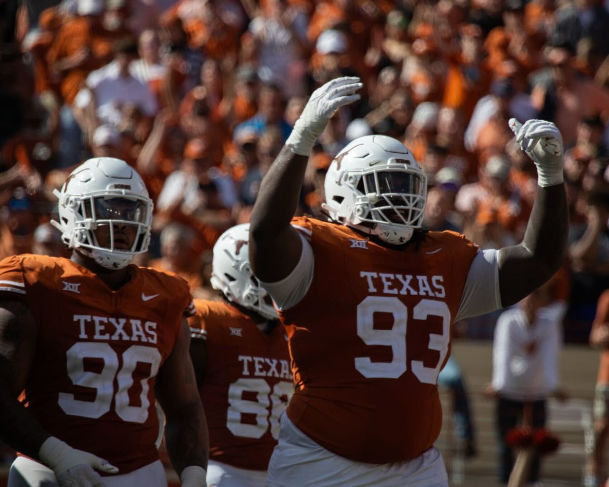 Defensive linemen TVondre Sweat and Byron Murphy during Texas game against Kansas State on Nov. 4, 2023.