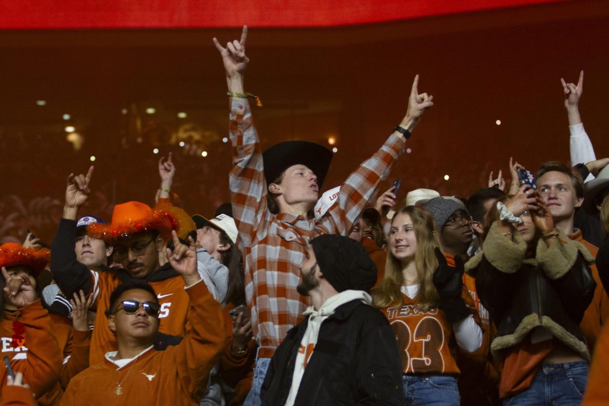 Texas fans cheer during Texas game against Texas Tech on Nov. 24, 2023.