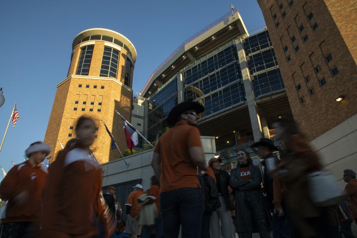 Fans wait outside of DKR-TMS before Texas' game against Texas Tech on Nov. 24, 2023.