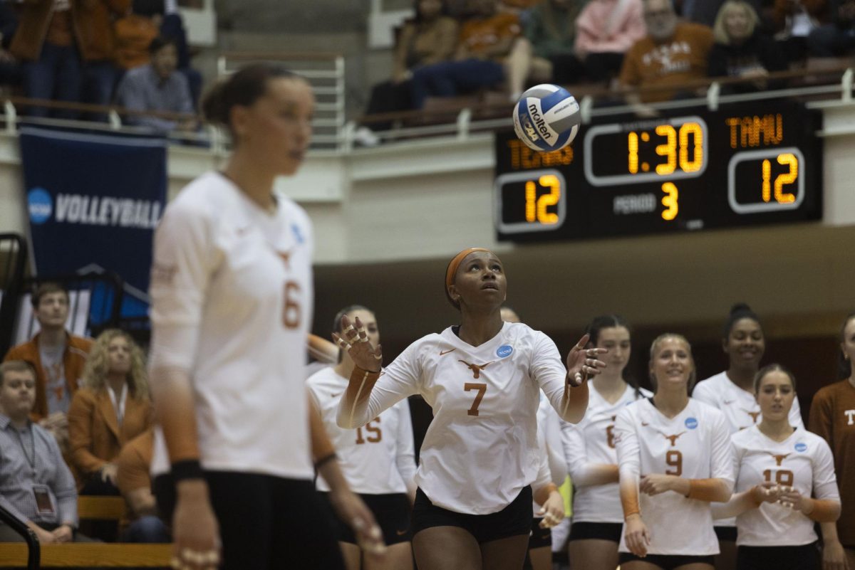 Middle blocker Asjia ONeal serves the ball during Texas game against A&M on Nov. 30, 2023. The game was the first round of the NCAA Volleyball Tournament, and Texas won 3-1. 