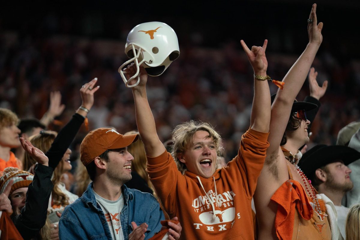 Texas fans cheer on the Longhorns during the fourth quarter of the game against Texas Tech on Nov. 24. 
