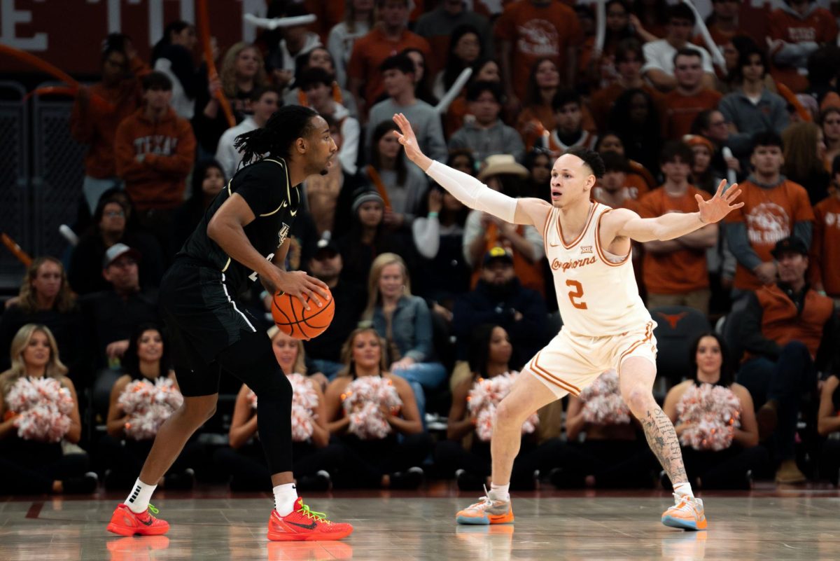 Guard Chendall Weaver defends the Texas basket during the game against the University of Central Florida on Jan. 17. 