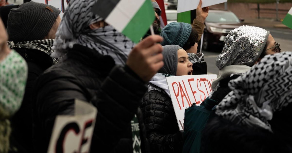 A child chants with the crowd at the All out for Palestine and Yemen protest at the Capitol on Jan. 21, 2024.