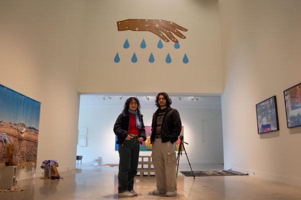 Somos Recuerdos exhibit curators Juilo Martinez and Fabiana Munoz-Olin stand in the exhibit space, which is still in progress, on Jan. 15, 2024. 