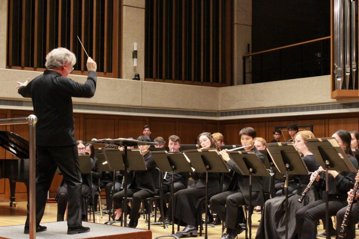 Conductor Jerry Junkin leads the Wind Ensemble in “Wine-Dark Sea: Symphony for Band” at the 10th anniversary performance at the Bates Recital Hall on Feb. 4, 2024.
