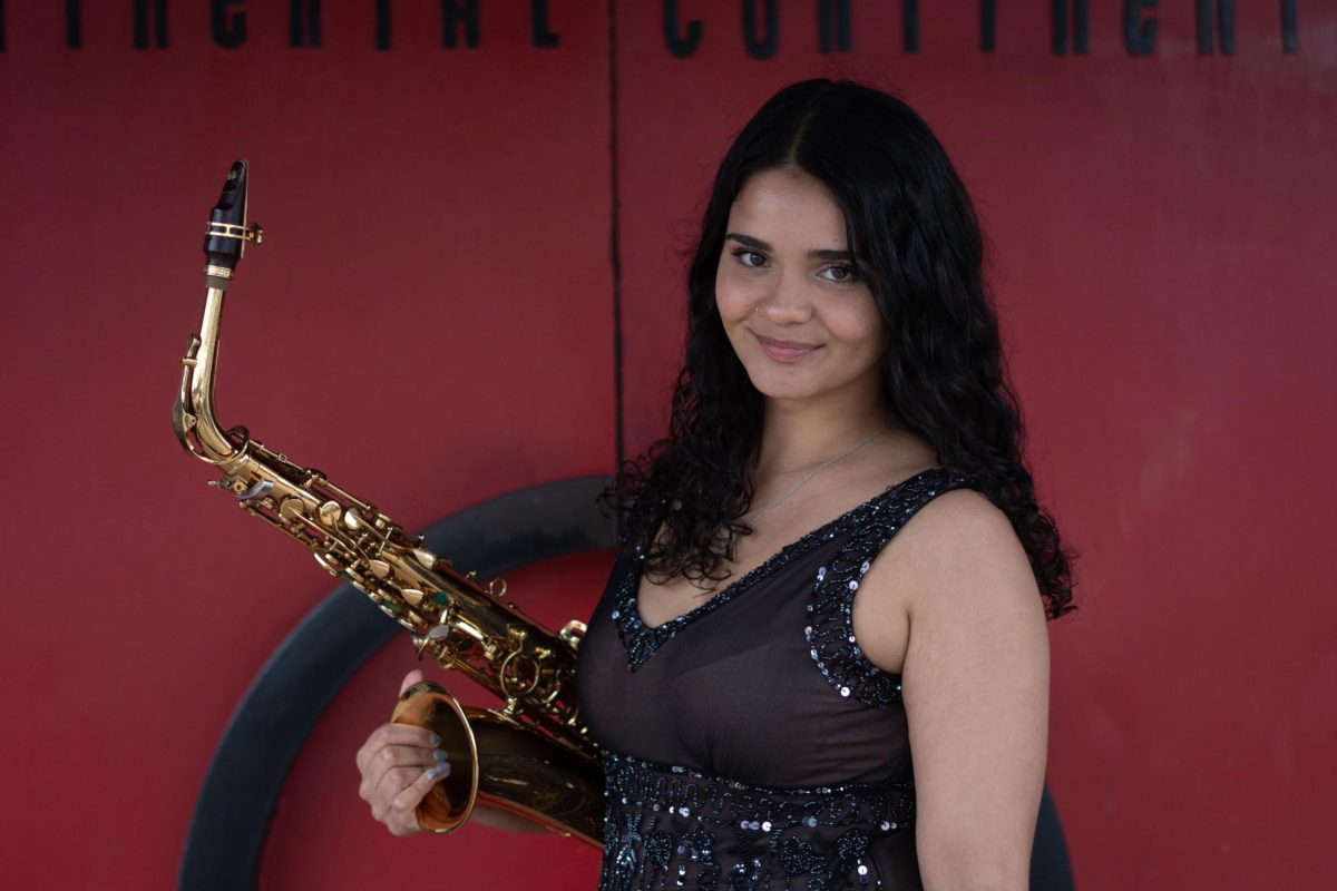 Renuka Jayasinghe, saxophonist and University of Texas alumna, stands for a portrait in front of The Continental Club where she use to hold a residency on Feb. 9, 2024. 