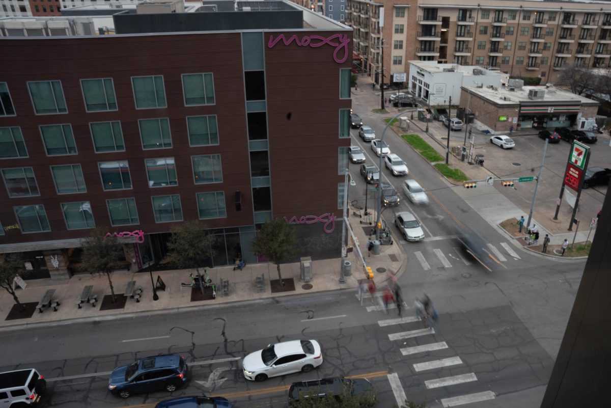 Pedestrians cross Guadalupe Street at 26th Street in Austin, Texas on Thursday.