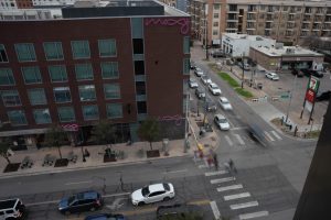 Pedestrians cross Guadalupe Street at 26th Street in Austin, Texas on Feb. 15, 2024.