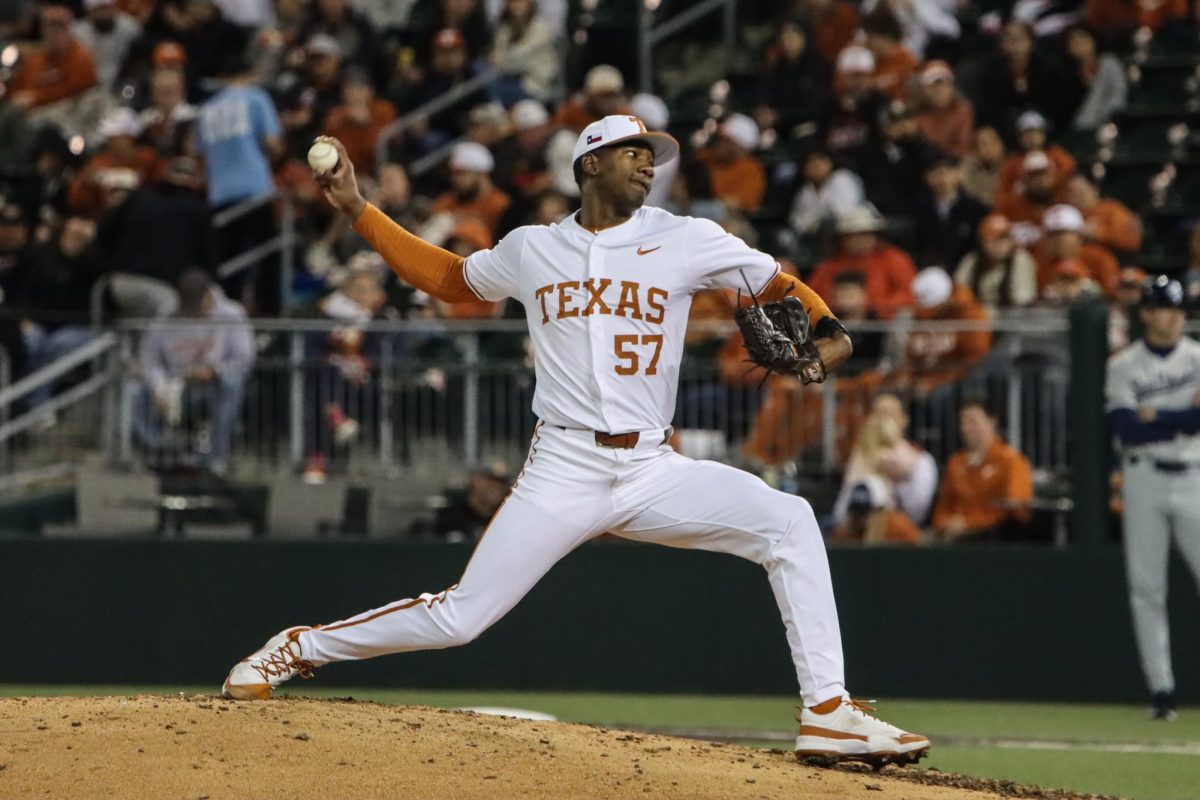 Redshirt junior Lebarron Johnson Jr. pitches during the second inning of the game against San Diego on Feb. 16, 2024. Johnson finished the game with six strikeouts, helping the Longhorns win 7-3.