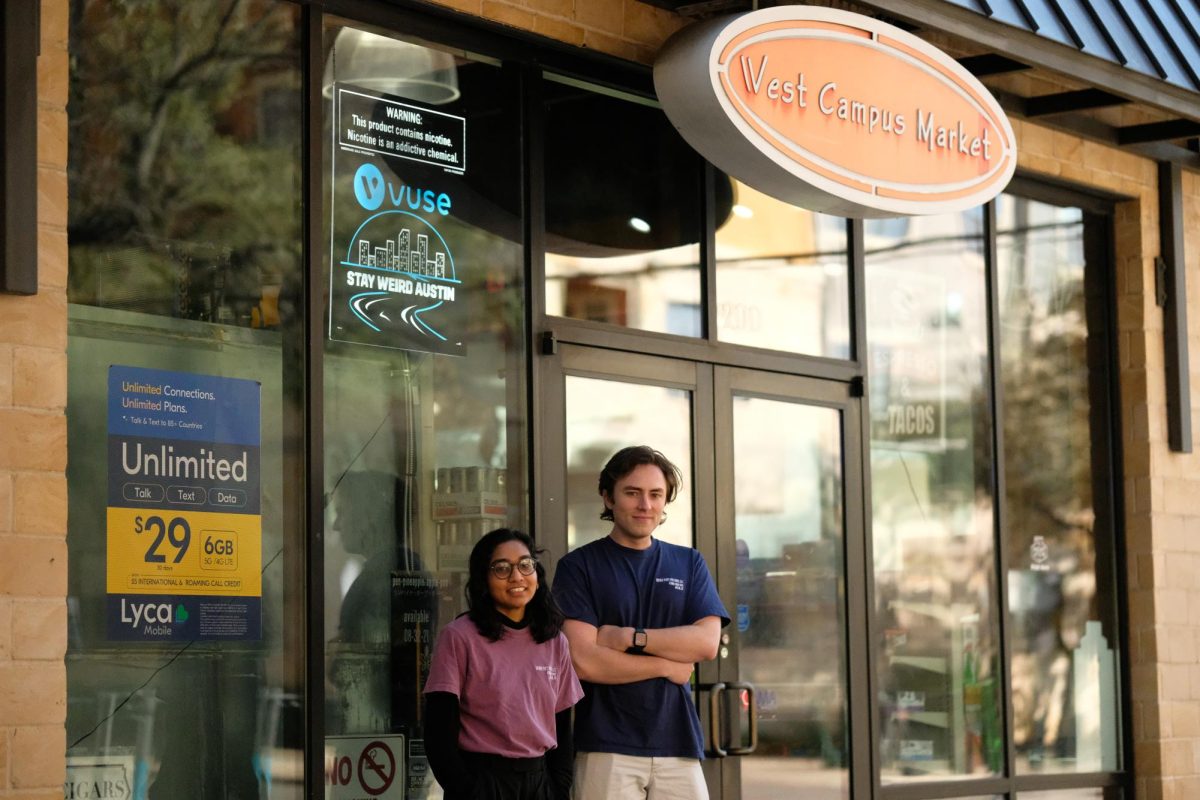 American Spirit director Christopher Yates and co-producer Sabrina Zahir stand in front of West Campus Market, a filming location on Feb. 17, 2024. 
