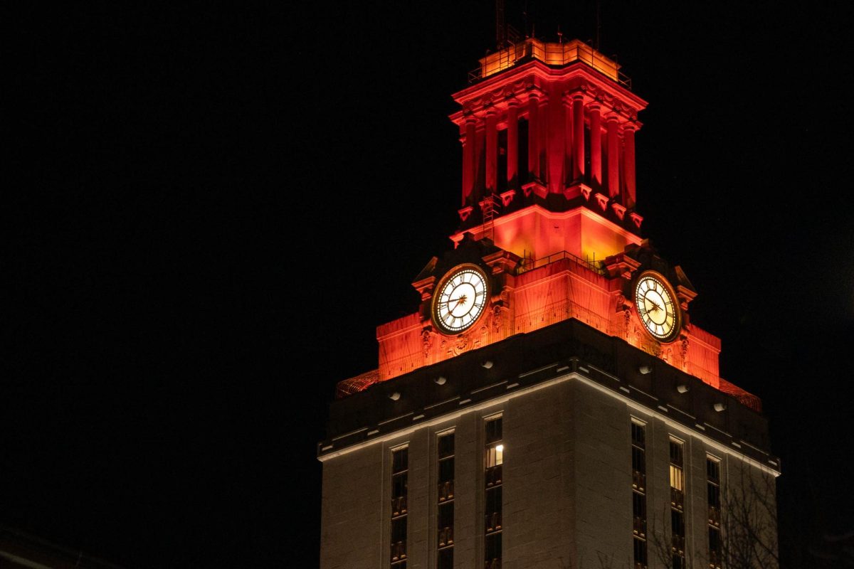 The University of Texas tower on Saturday, Feb. 24, 2024. The tower was lit up orange for the  Womens Indoor Track and Field Big 12 Championship win. 