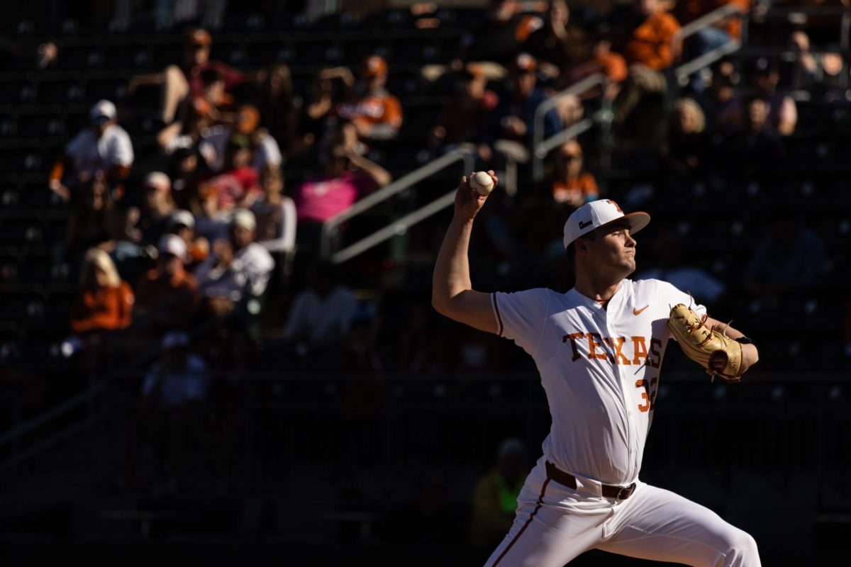 Pitcher Charlie Hurley during Texas Alumni game on February 2.