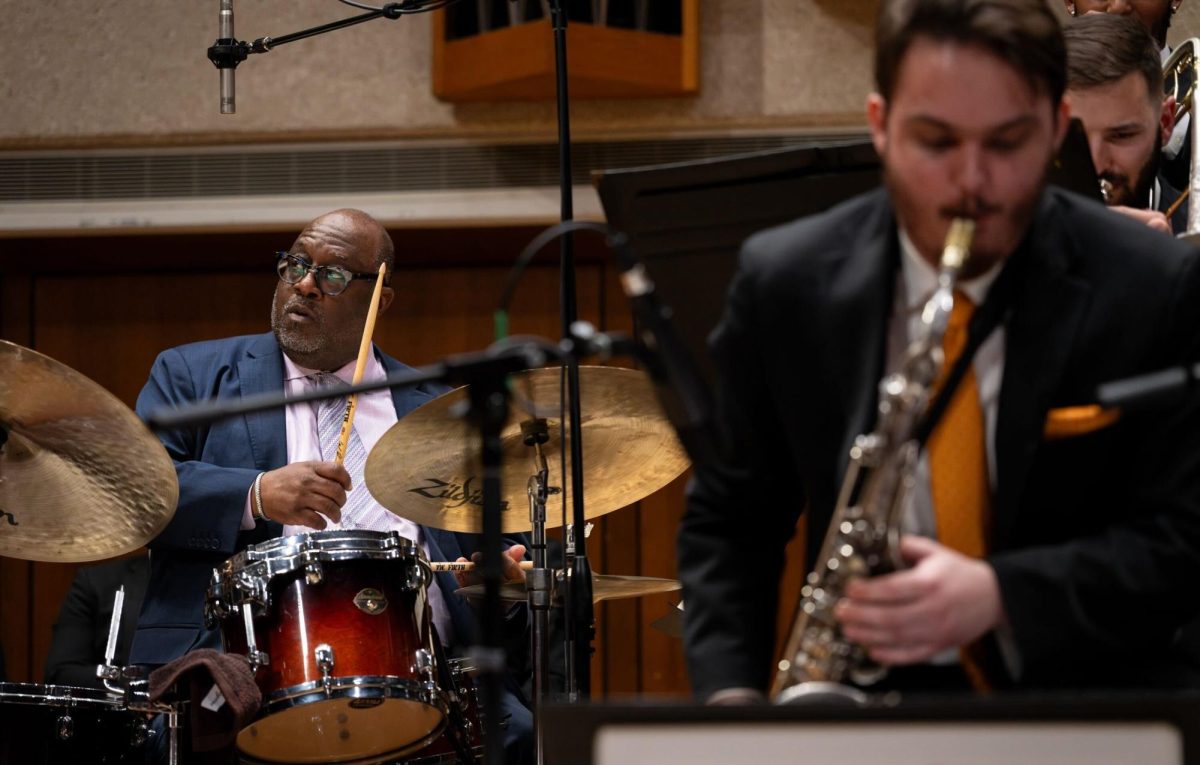 Renowned jazz drummer and composer Carl Allen, left, performs with the UT Jazz Orchestra at the Bates Recital Hall on Feb. 23, 2024.