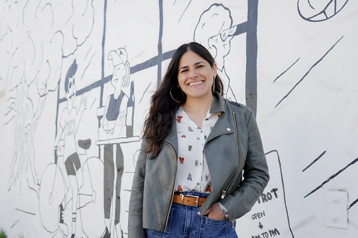 Assistant Professor Iliana Sosa stands in front of a mural in Austins South Congress neighborhood on Feb. 5, 2024.		