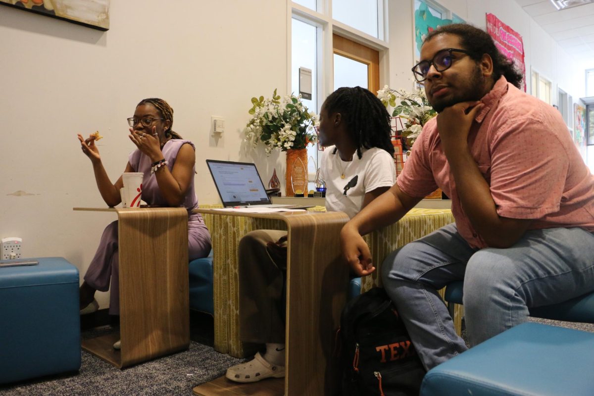 Christianna McAfee, Fikayomi Johnson, and Evan Craig sit in the former Multicultural Engagement Center on Monday, March 4, 2024. 