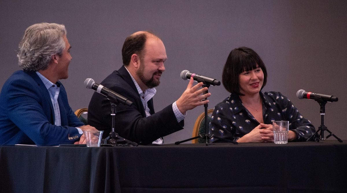 From left, Ryan Streeter moderates a debate with New York Times writers Ross Douthat and Michelle Goldberg. The debate, Is Liberalism Doomed? took place on Friday in the Alumni Center as part of the Civil Discord series.