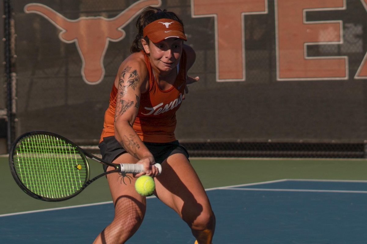 Redshirt sophomore Vivian Ovrootsky hits the ball during the match against OSU player Ayumi Miyamo on Friday. Ovrootsky won the match in two sets. 