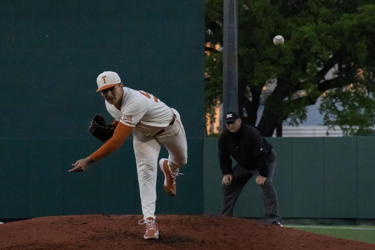 Left-handed pitcher Luke Harrison pitches the ball to a batter during Texas game against Texas A&M Corpus Christi on Tuesday, March 26, 2024. 