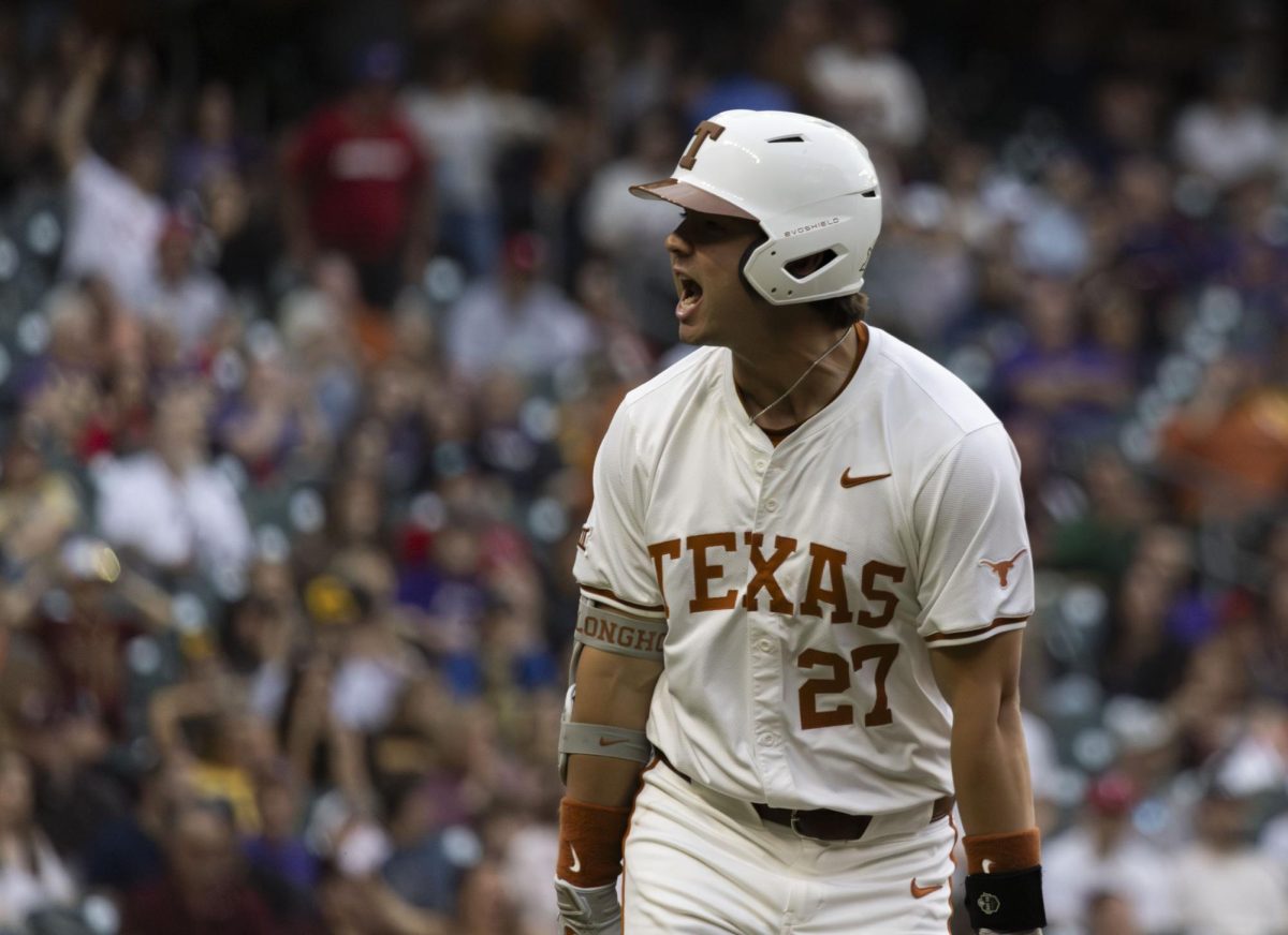 Infielder Jack ODowd celebrates his home-run during Texas game against Texas State on Saturday. The Horns fell to the Bobcats 11-10.