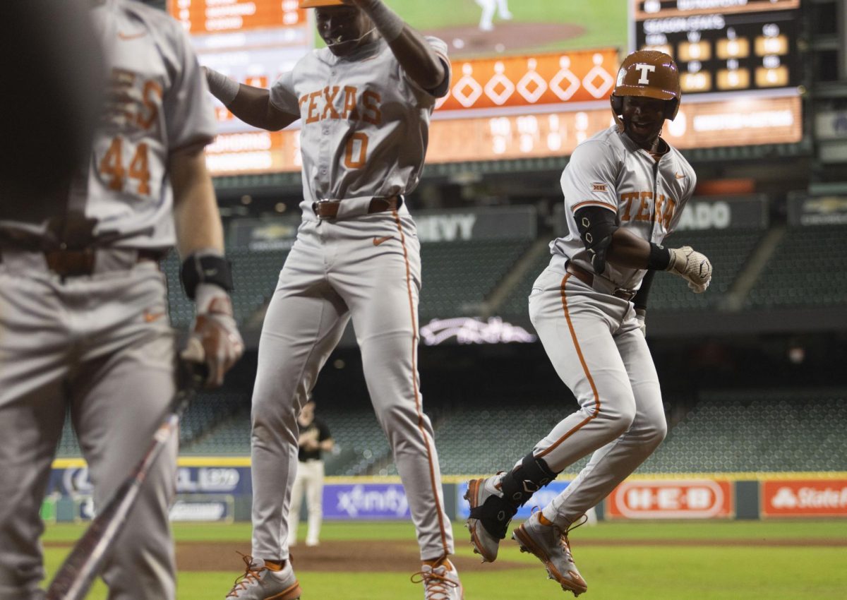 Outfielder Porter Brown celebrates his home run during Texas game against Vanderbilt on March 3, 2024. The Longhorns lost 14-11.