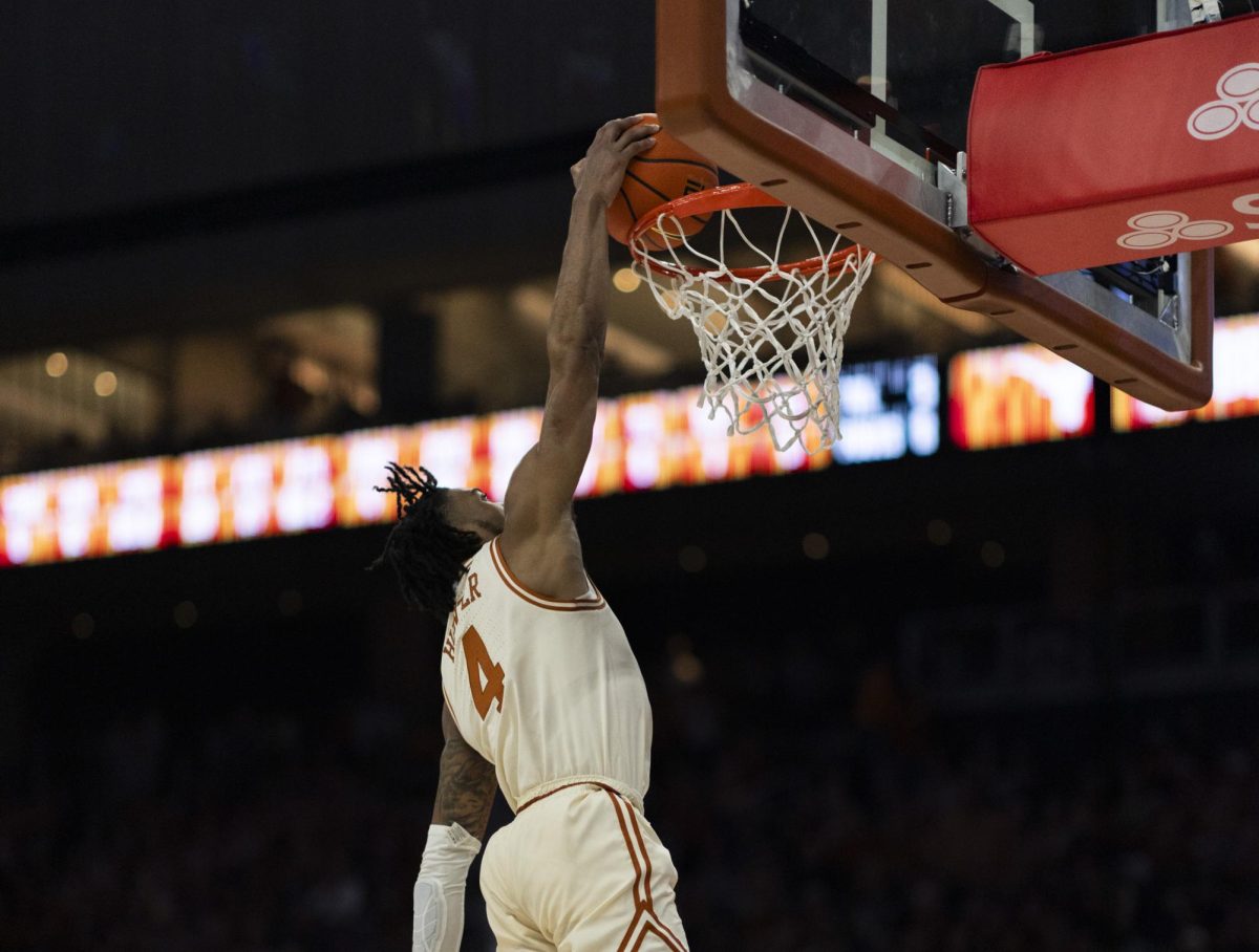 Tyrese+Hunter+goes+for+a+layup+during+Texas+game+against+Oklahoma+on+Saturday.+The+Longhorns+defeated+the+Sooners+94-80+during+their+last+home+game+of+the+season.