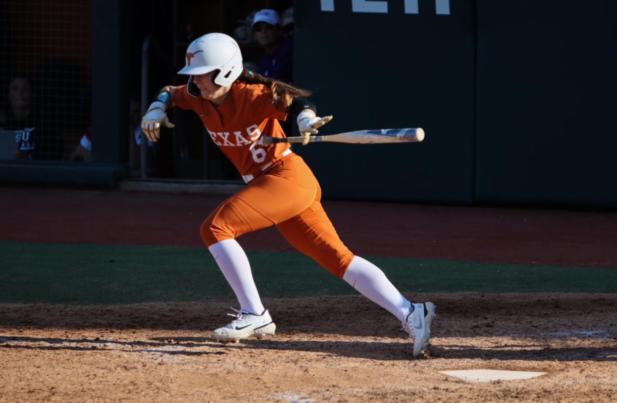 Senior+outfielder+Bella+Dayton+drops+her+bat+as+she+runs+towards+first+base+on+March+1.+Dayton+had+1+hit+and+1+run+to+contribute+to+the+Longhorns+10-2+victory+over+Northwestern+State.