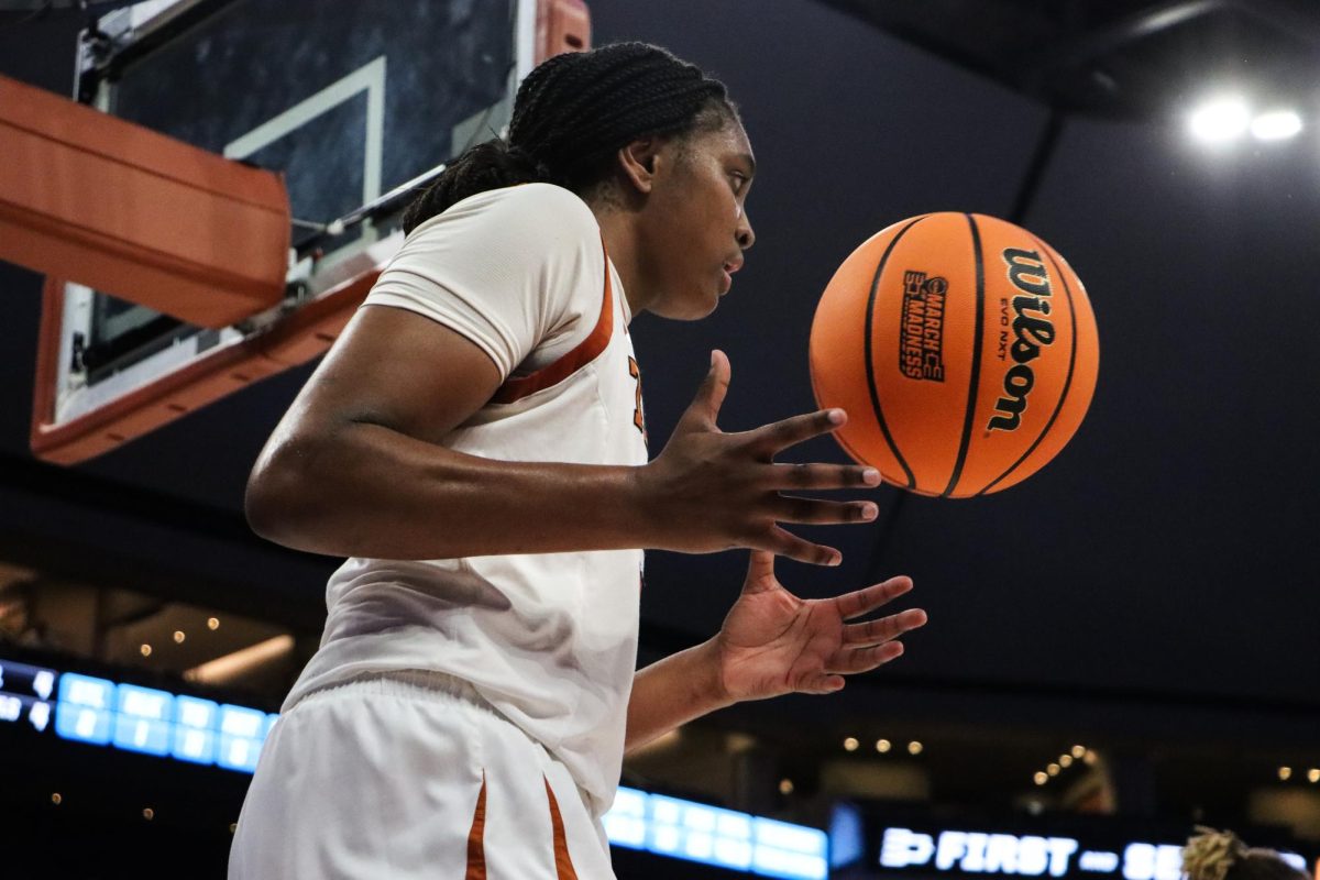 Freshman forward Madison Booker prepares to throw in the ball against Alabama in the second round of the March Madness tournament on Sunday, March 24, 2024. Booker scored 21 points to help the Longhorns defeat the Crimson Tide 65-54.