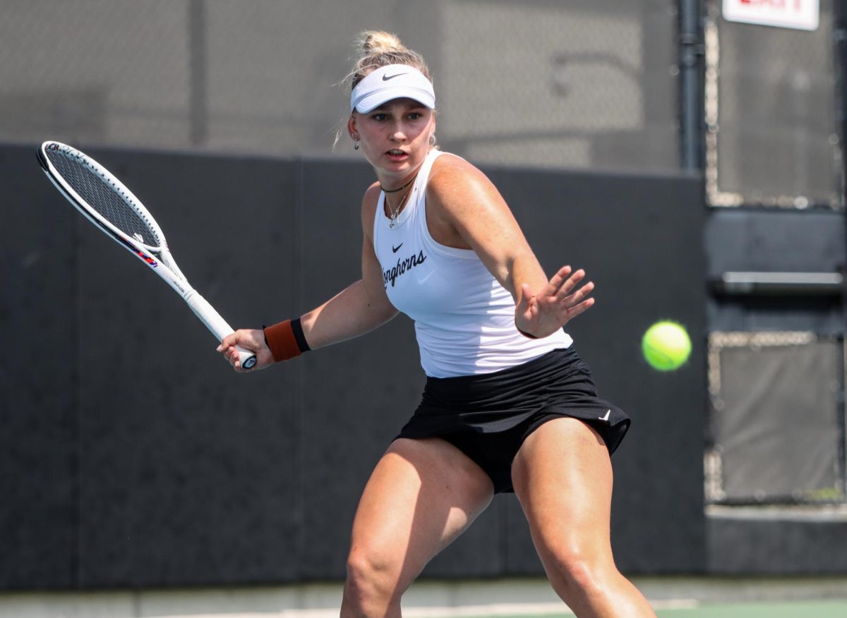 Graduate student Tanya Sasnouskaya prepares to hit the ball during singles play against Oklahoma on March 3, 2024.