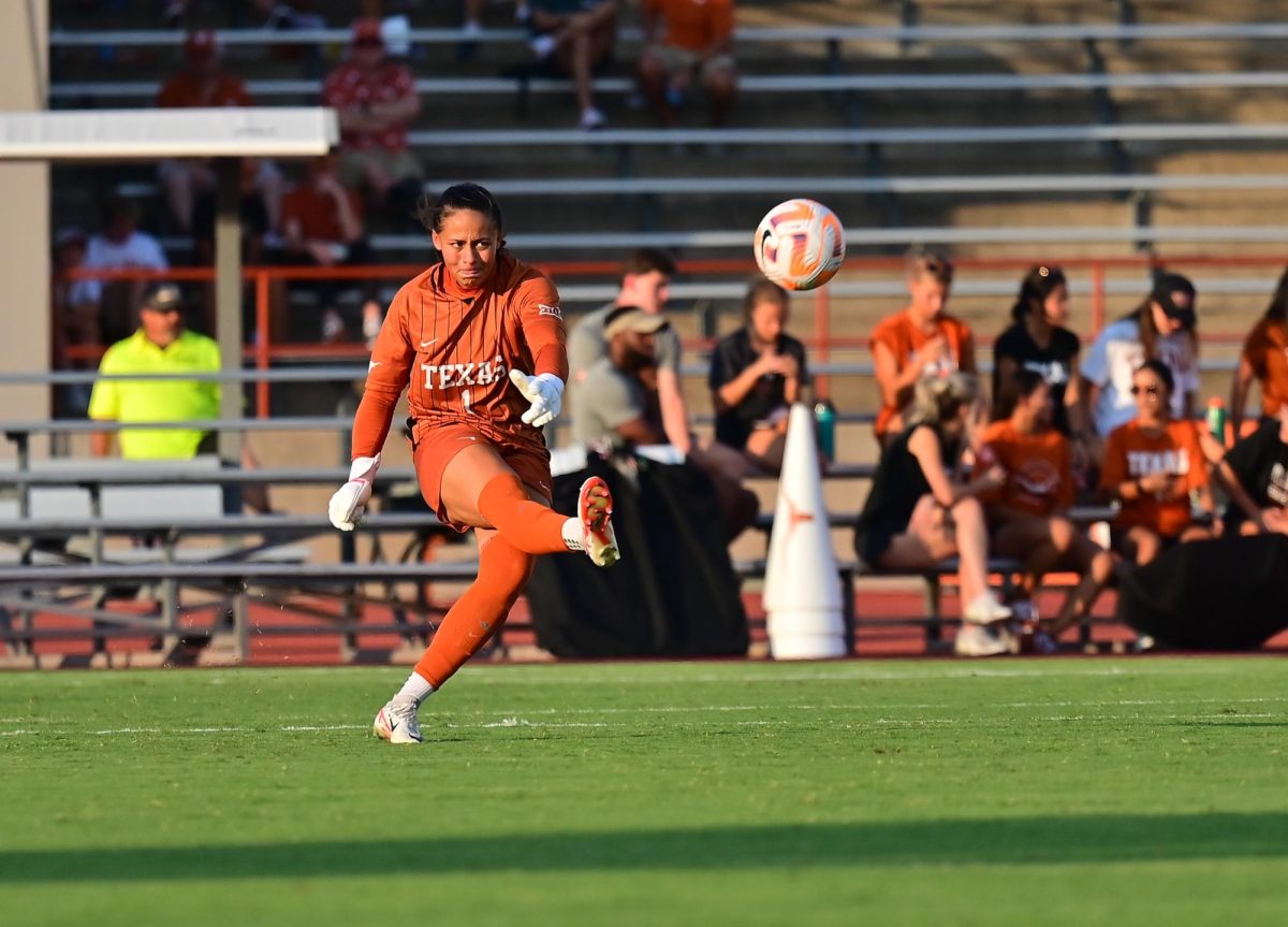 Junior+goalkeeper+Mia+Justus+kicks+the+ball+to+a+teammate+on+Sept.+3%2C+2023.+The+Longhorns+defeated+the+SMU+mustangs+6-0.+