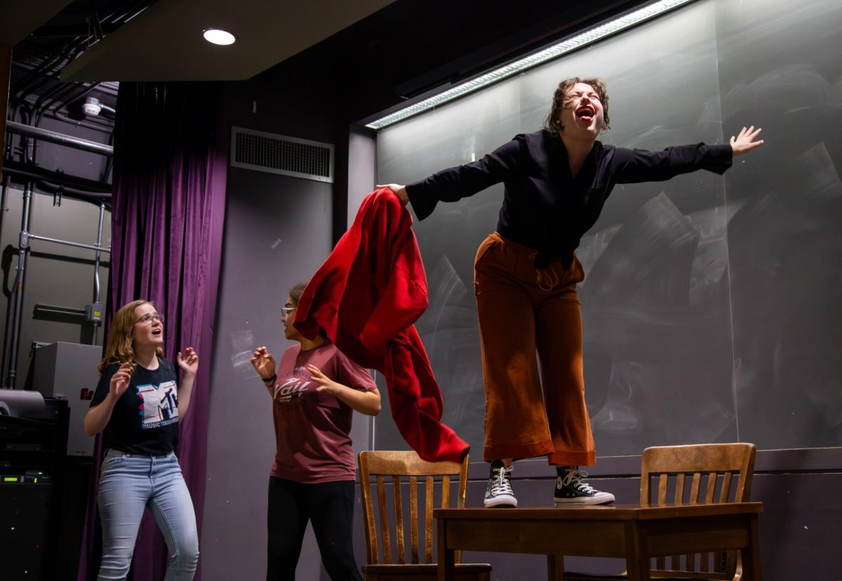 From left University Theatre Guild actors Macy Hempe, Madden Shoebotham and Cooper Madison rehearse for UTGs semesterly childrens show on March 29, 2024. This year, UTG is putting on Bluey.