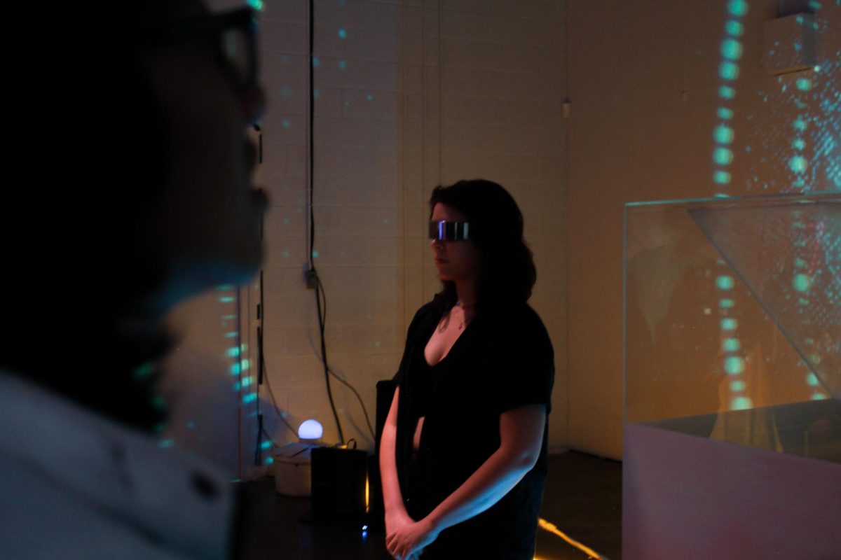 A member of the Texas Immersive Institute acts as part of the interactive experience Elysian Heights on Saturday.