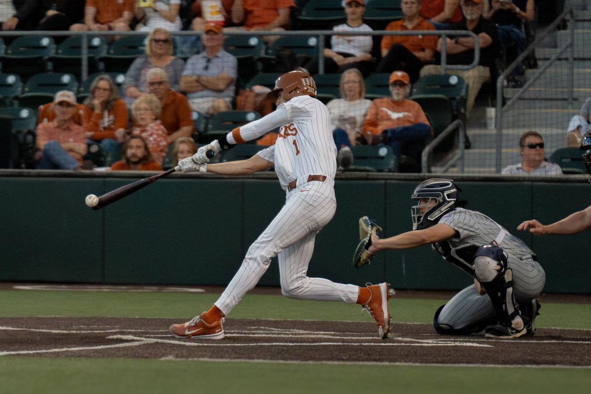 Infielder Jalin Flores hits a home run during Texas game at home against BYU on April 5, 2024. 