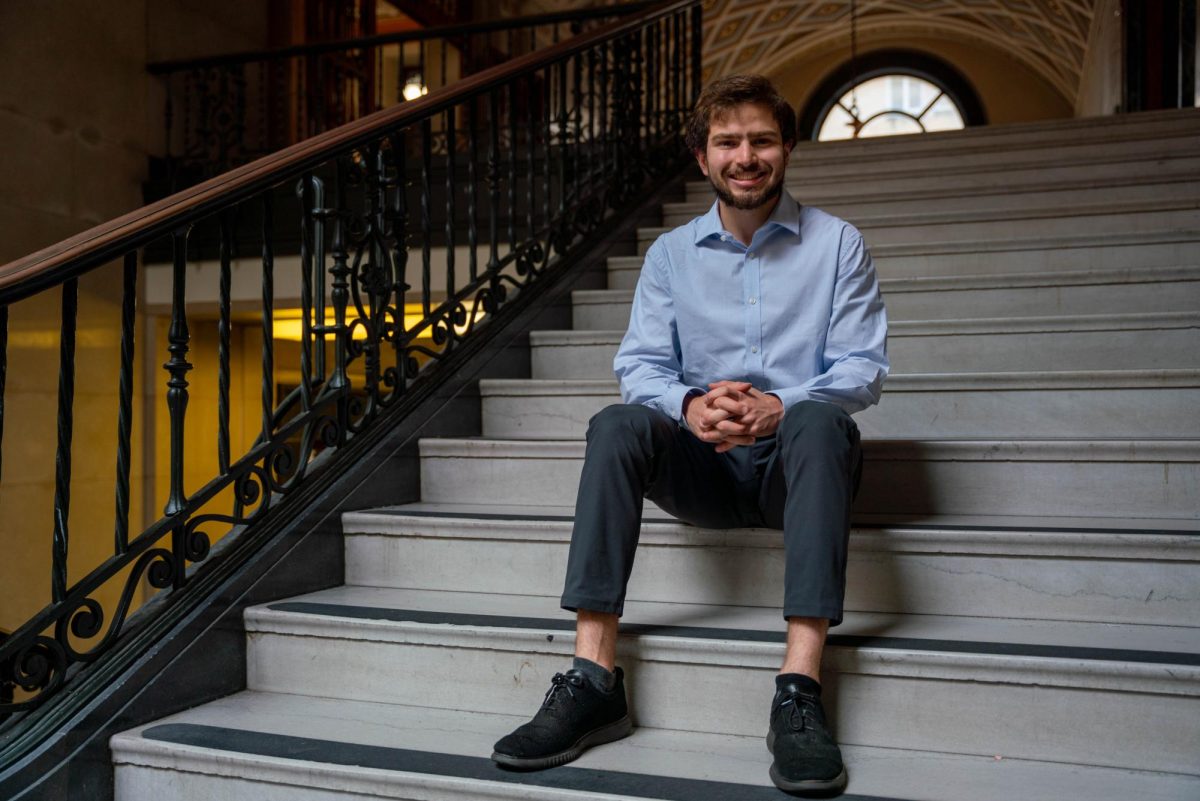 Government senior Elijah Kahlenberg poses for a portrait in a stairwell in the UT tower on April 18, 2024. The Harry S. Truman Foundation awarded Kahlenberg and 59 other students the Truman Scholarship, which awards $30,000 to those pursuing public service careers.