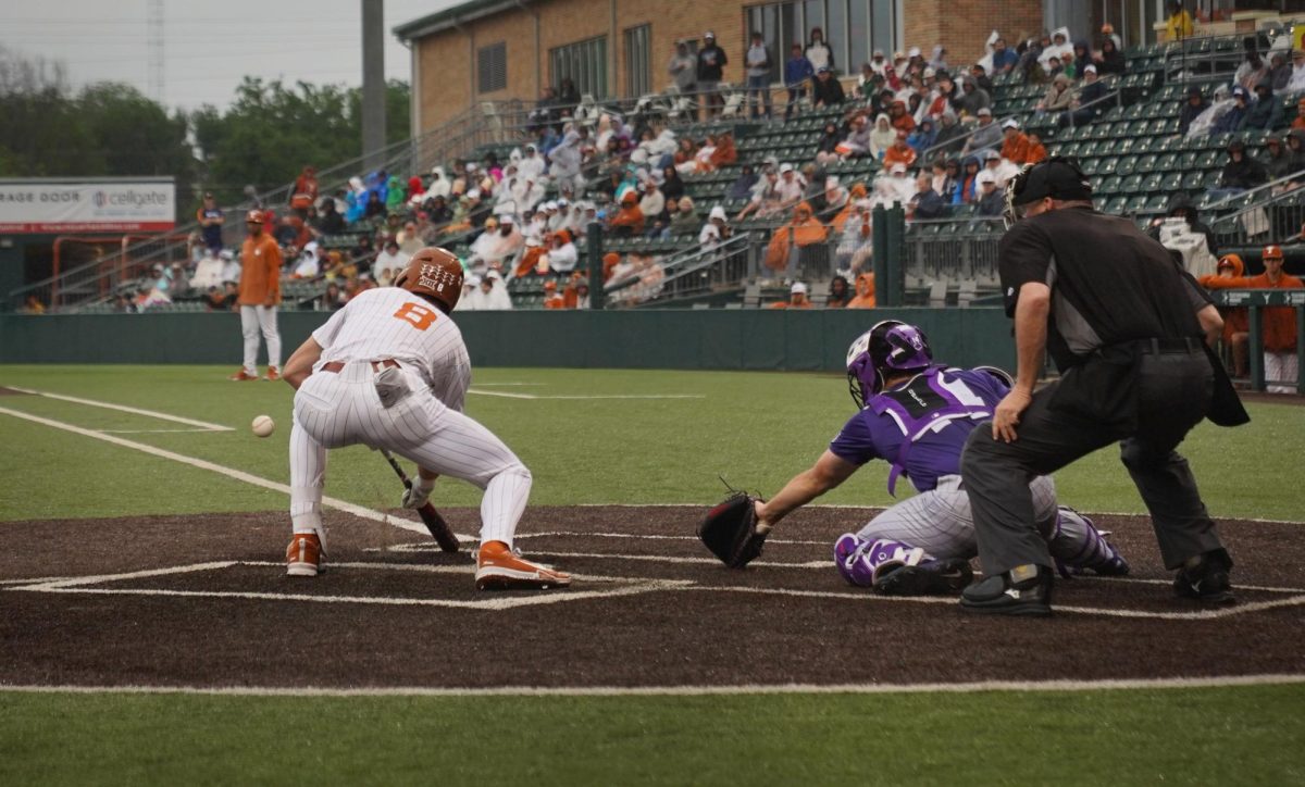Freshman+outfielder+Will+Gasparino+attempts+to+bunt+the+ball+during+Texas+game+against+TCU+on+Saturday%2C+April+20%2C+2024.+