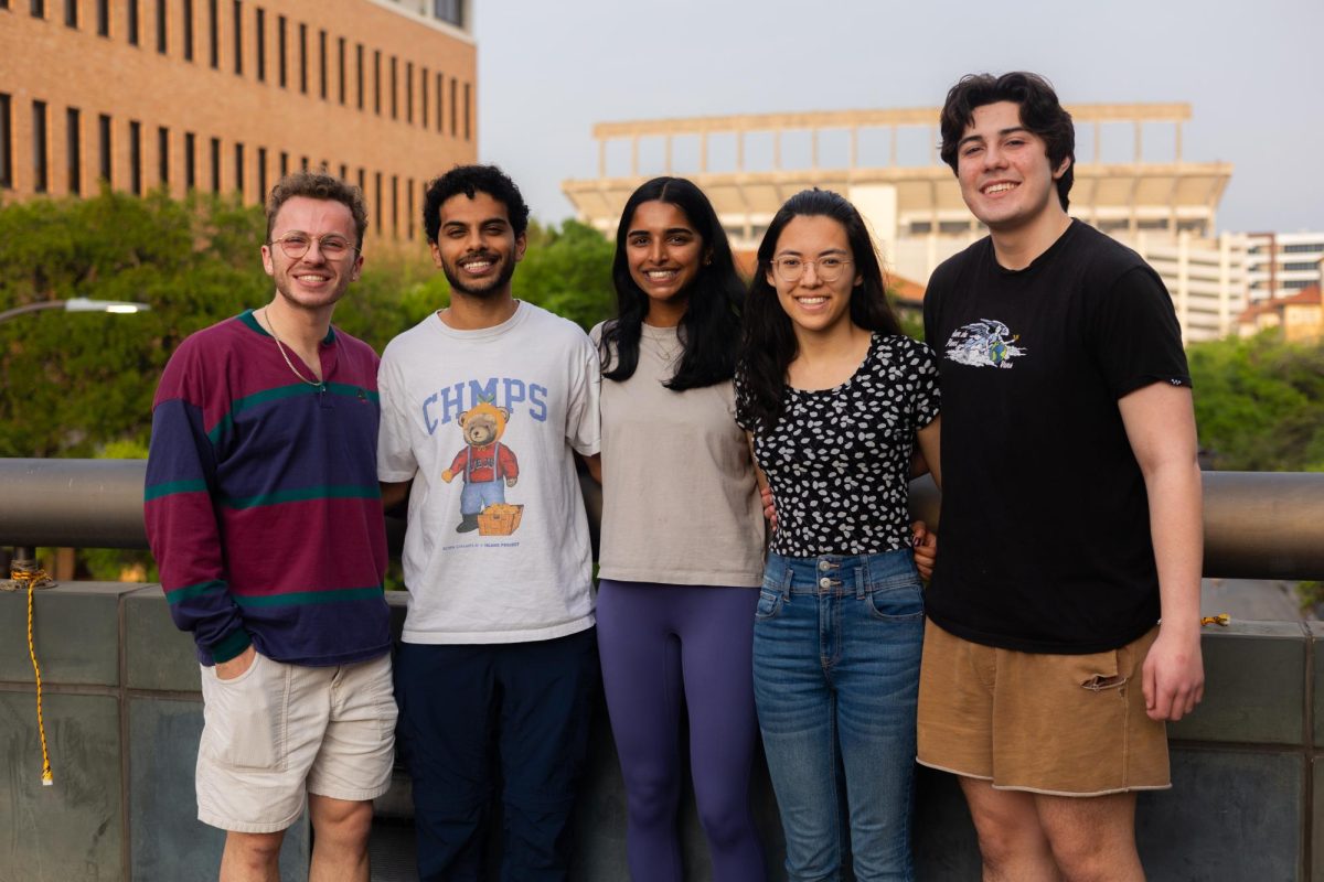 Nick Grammer, Sid Reddy, Neha Papil, Crystal Lerner and James Wyatt pose for a group portrait at the UT Partners in Health meeting on Monday, at the University of Texas at Austin.