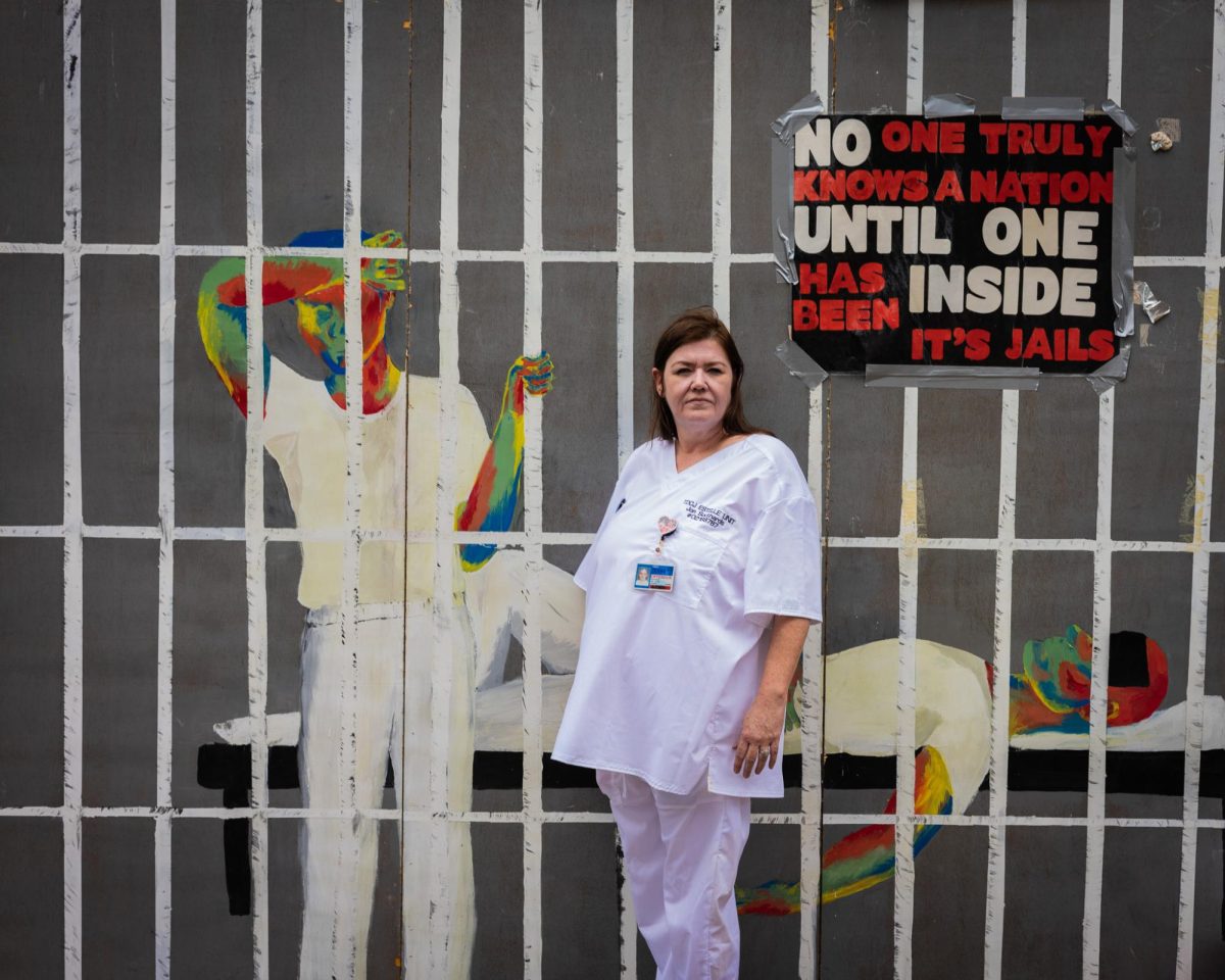 Tona Southards Naranjo, the mother of a former TDCJ inmate who passed away in prison due to heat, stands in front of the 85 to Stay Alive prison cell simulation outside the Harry Ransom Center on April 17, 2024.