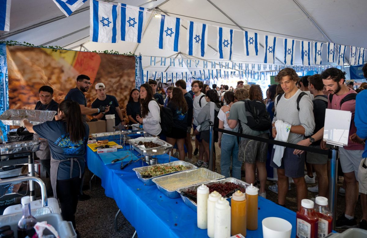 Students+line+up+for+catering+at+Texas+Hillels+24th+Annual+Israel+Block+Party+on+Tuesday%2C+April+2%2C+2024.
