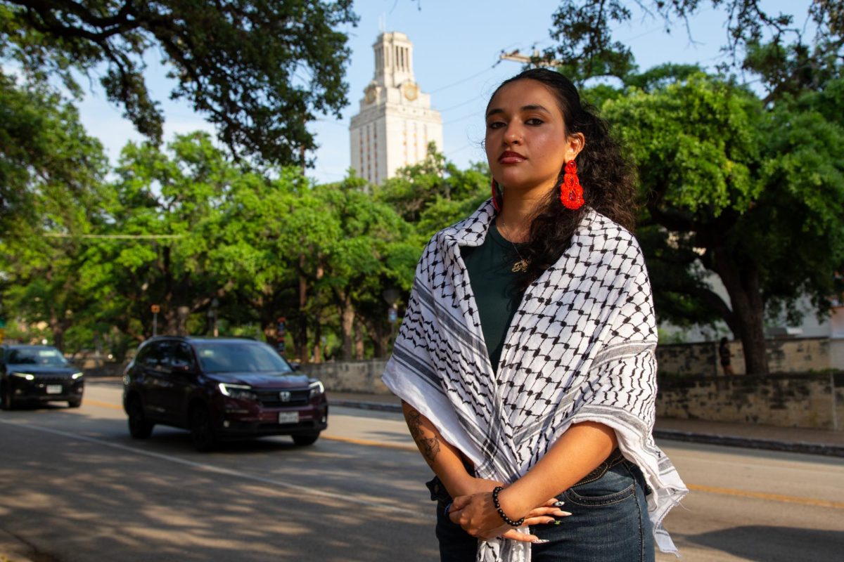 Anne-Marie Jardine, an International Relations and Global Studies senior, poses at the intersection of 24th and Guadalupe Street on April 26, 2024. Jardine was arrested on the South Lawn at a pro-Palestine protest two days prior.