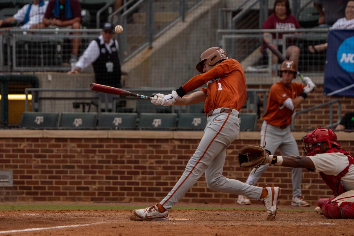 Sophomore shortstop Jalin Flores hits the ball during Texas game against Louisiana in the NCAA Baseball Regional Tournament in College Station, Texas on Friday. Flores hit his third grand slam of the season in the fifth inning to put the Longhorns in the lead. 