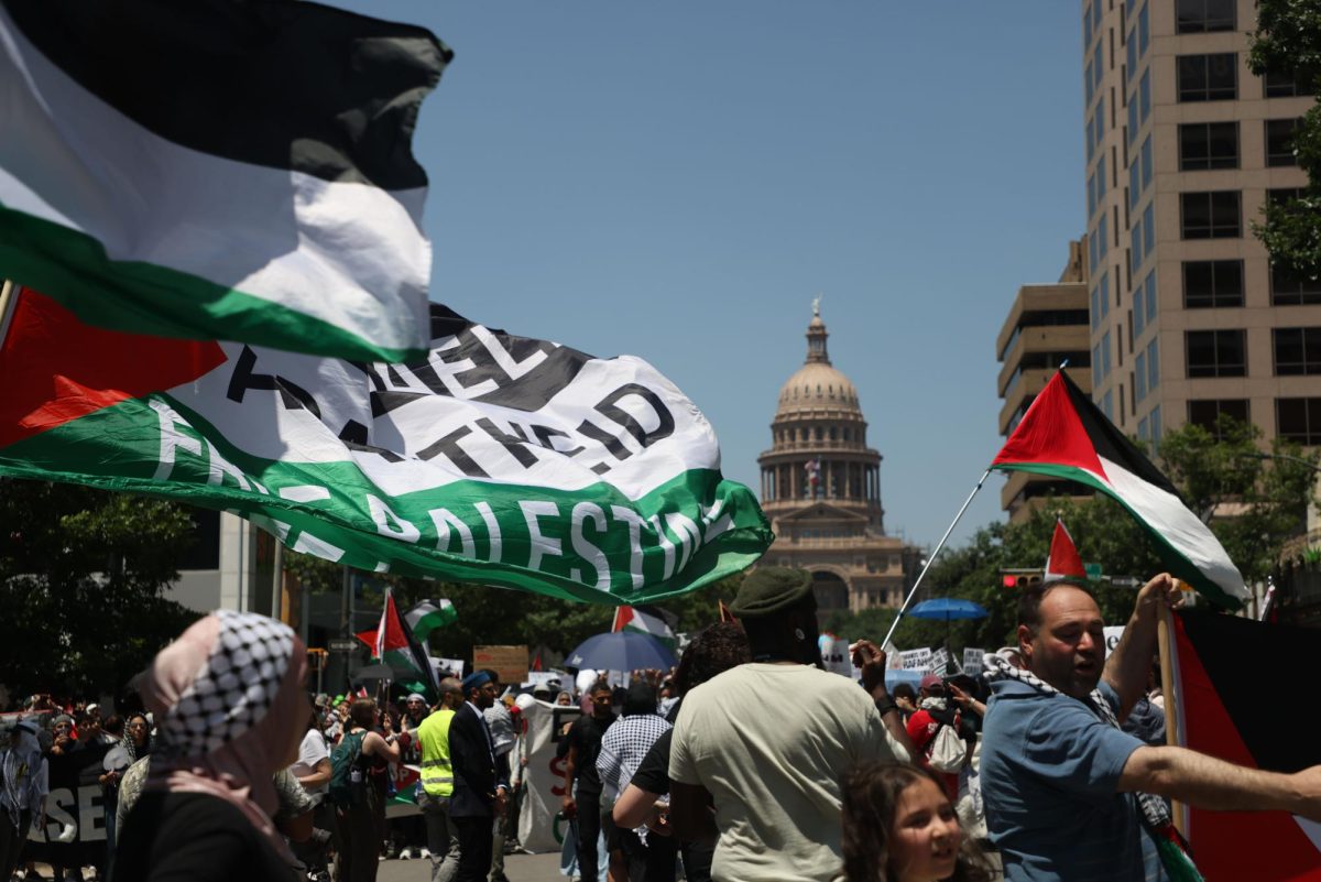 Pro-Palestine protesters gather outside of the Capitol on Sunday.