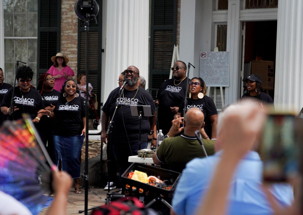 Christopher D. Spivey & Co. gospel choir perform at the Neill-Cochran House Museum Juneteenth celebration. After tours of the slave quarters and barbeque was served, Spivey led his choir in multiple songs including “Melodies from Heaven,” by Kirk Franklin.