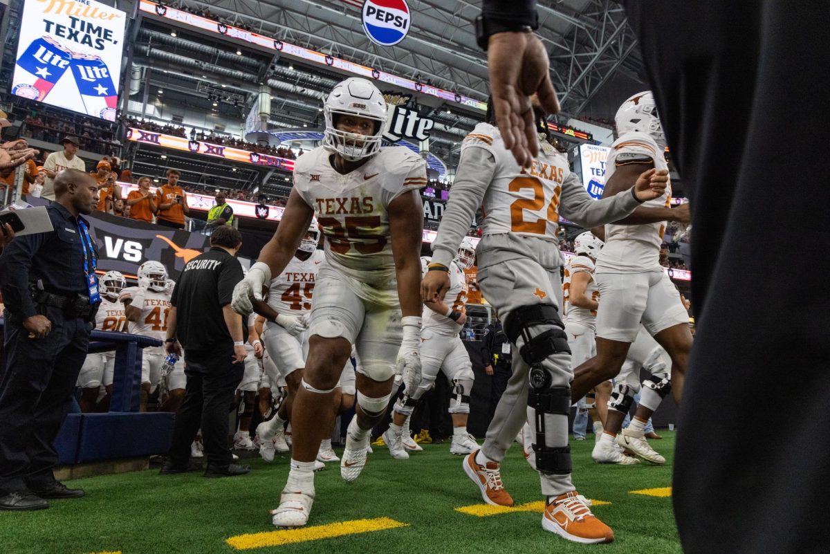 Texas+runs+out+to+the+field+at+the+beginning+of+the+second+half+of+the+Big+12+Championship+game+on+Dec.+2%2C+2023.