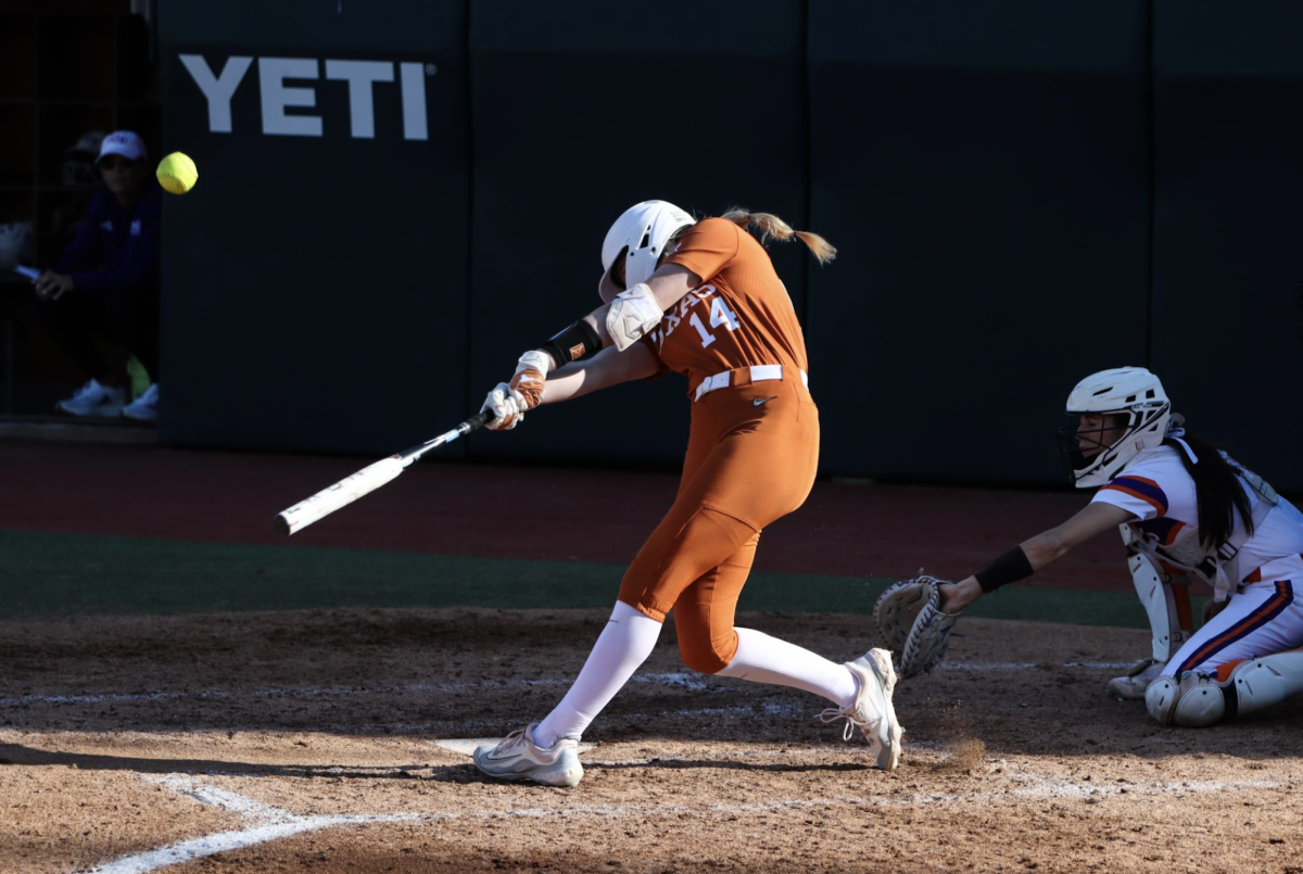 Sophomore first baseman Reese Atwood hits the ball during Texas' game against Northwestern State on March 1, 2024.