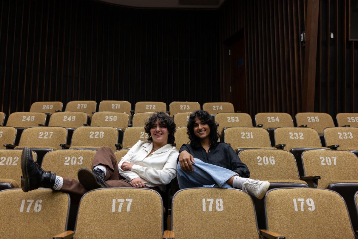 Anna Buendia (left) and Simi Thakur (right) sit in an FAC classroom on July 1, 2024.