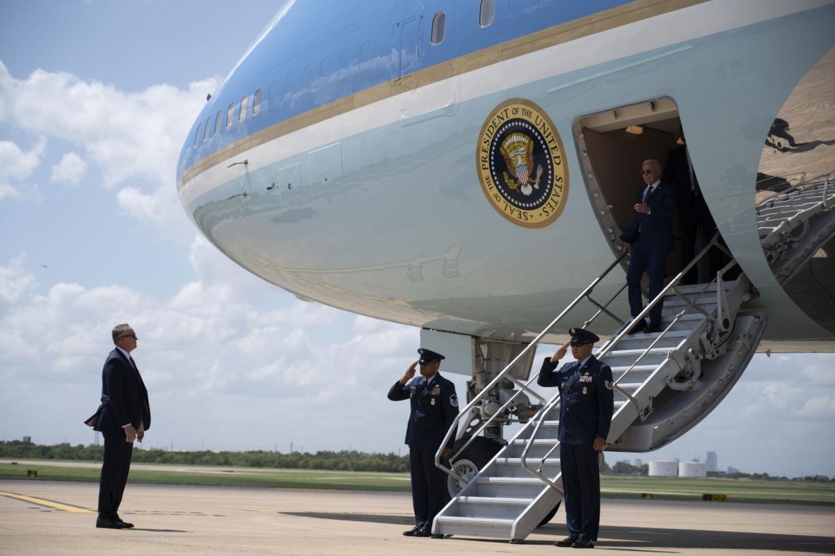 President Biden greets supporters on the tarmac after landing in at Austin-Bergstrom International Airport on Monday ahead of his speech at the LBJ Library on UTs campus.