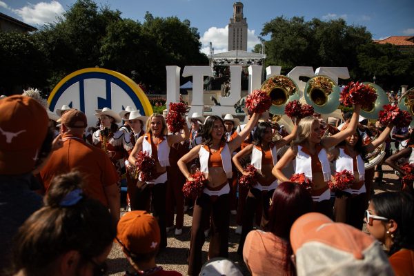 Texas Spirit dances in front of Littlefield Fountain on June 30, 2024.