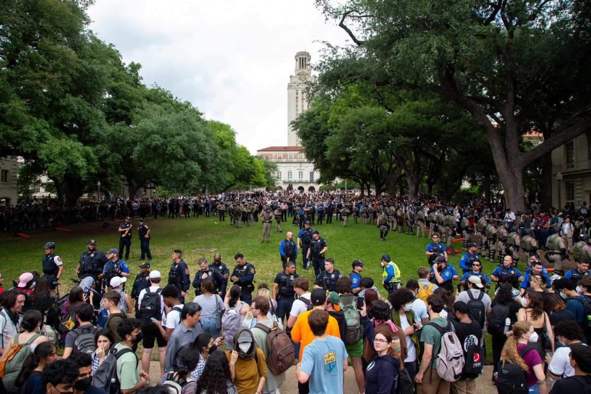 Law enforcement pushed protesters off Main Mall lawn on April 24, 2024.