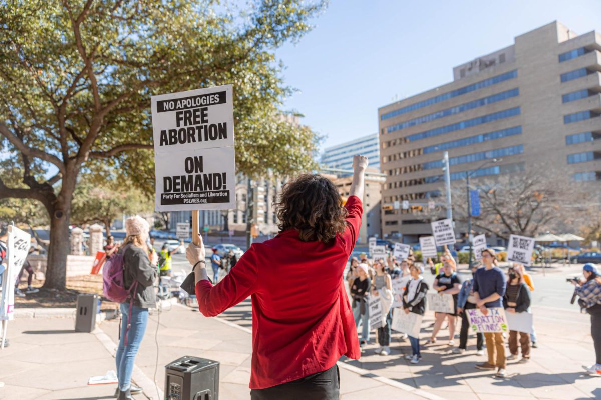 Protesters gather outside of the Texas State Capitol on Jan. 22, 2023.