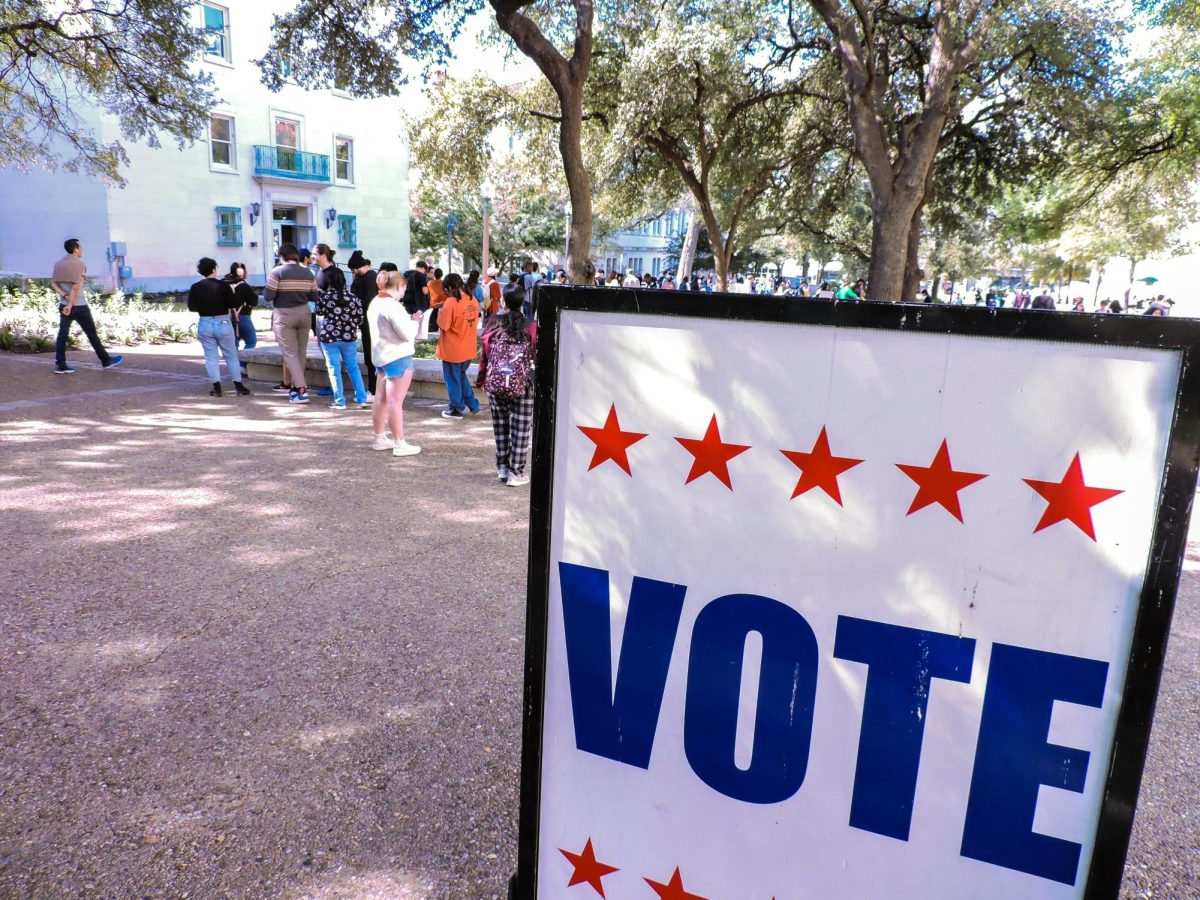 Students congregate on the West Mall, waiting in line to vote on Nov. 3, 2023. The voting took place inside the Flawn Academic Center.